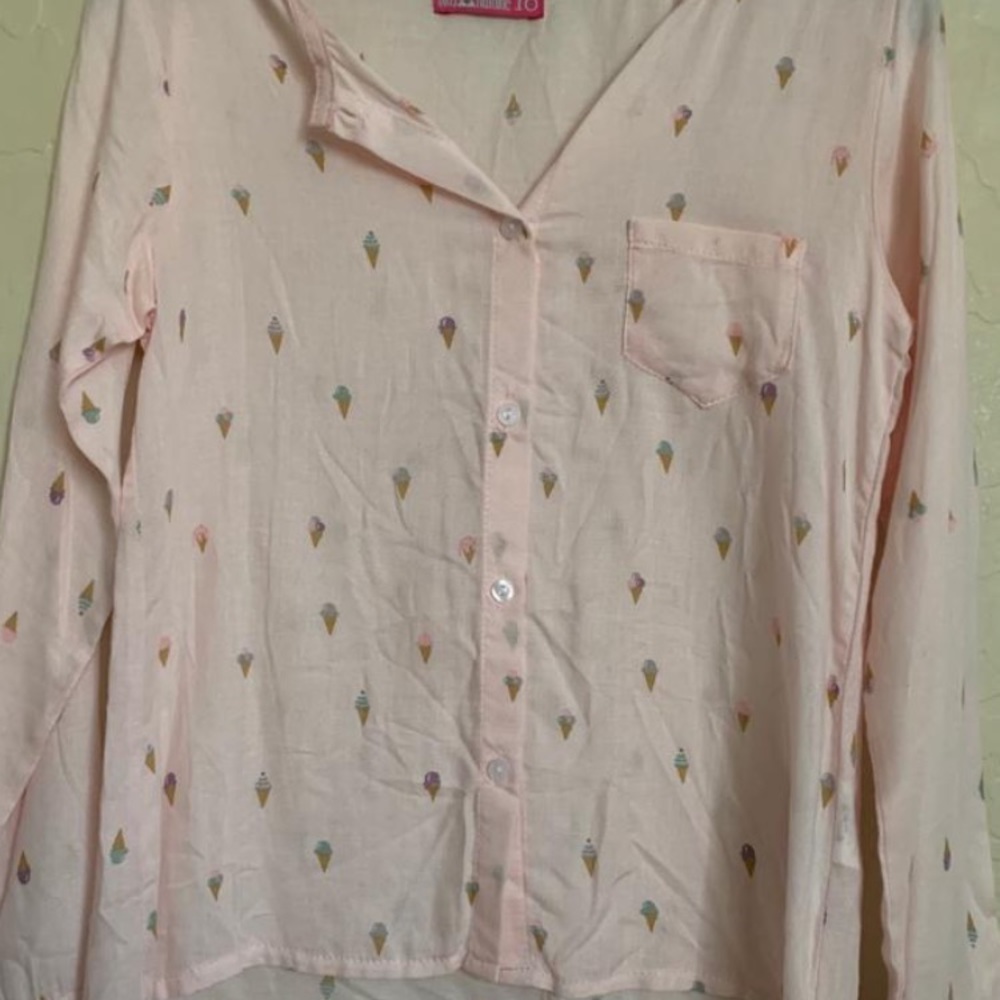 This is a Girls Attitude (brand) shirt!